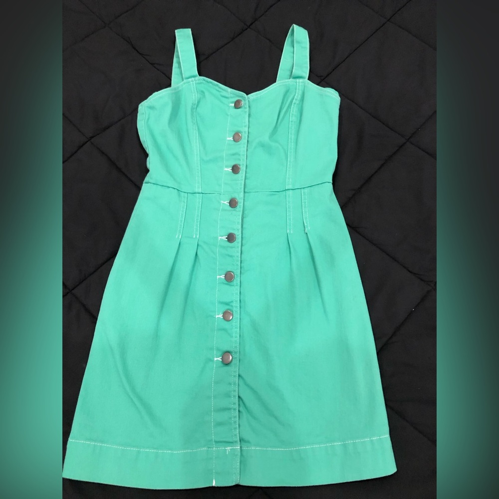 Green denim dress! Worn once. Fitted. Juniors size 7 but would fit women’s small